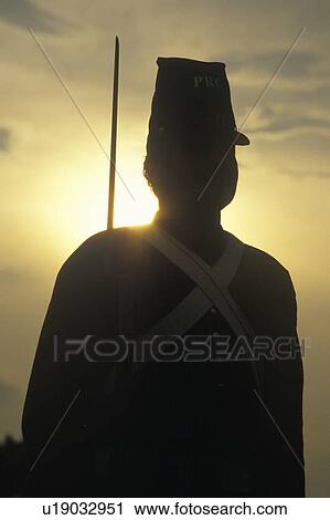 Silhouette of soldier at sunset View Large Photo Image Stock Image - Silhouette of soldier at sunset. Fotosearch