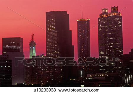 Stock Photo - Skyline view at sunset of the state capital of Atlanta. Fotosearch