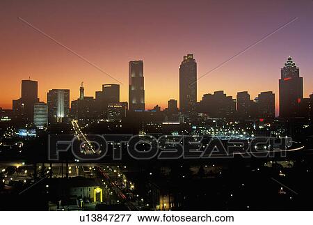 Stock Photo - Skyline view at sunset of the state capital of Atlanta. Fotosearch