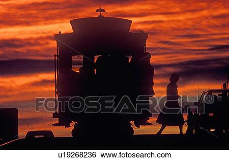 Stock Photograph - Special Effects - Sunset on one of San Francisco's famous cable cars. Fotosearch