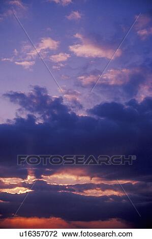 Sun Setting Through Clouds View Large Photo Image Stock Image - Sun Setting Through Clouds. Fotosearch