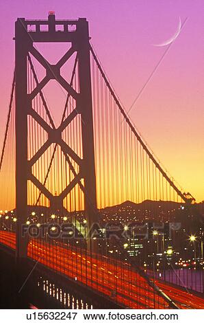 Stock Photo - Sunset on the Bay Bridge to San Francisco. Fotosearch