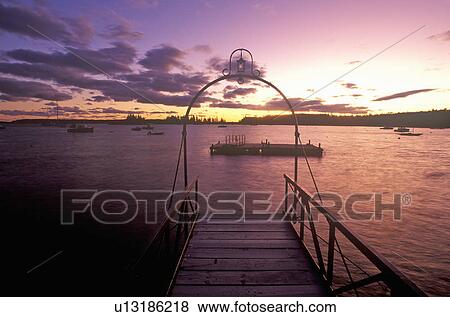 Stock Photo - Sunset over Lobster village on Mount Desert Island. Fotosearch