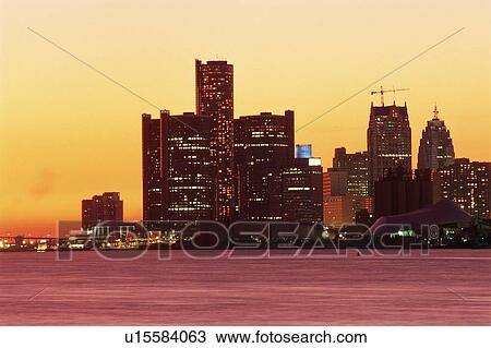 Stock Image - Detroit, Michigan skyline at sunset. Fotosearch