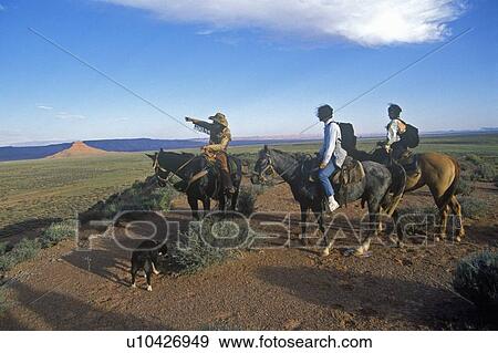 Stock Photo - Horseback riding in Valley of the Gods. Fotosearch