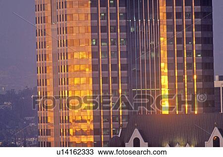 Sunset on office buildings in Los Angeles View Large Photo Image Stock Image - Sunset on office buildings in Los Angeles. Fotosearch