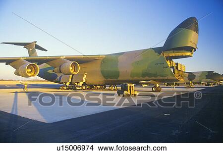 Picture - Cargo Plane at Airforce Base, Sunset. Fotosearch