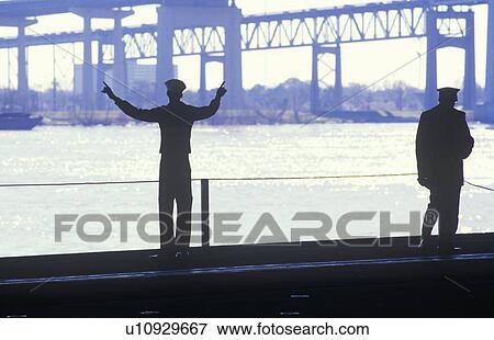 Stock Photo - Two Sailors on the USS Forrestal Aircraft Carrier. Fotosearch