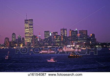 Stock Photo - View of Manhattan at night. Fotosearch