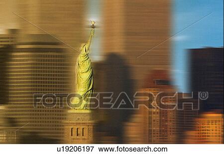 Stock Photo - World Trade Center behind Statue of Liberty. Fotosearch