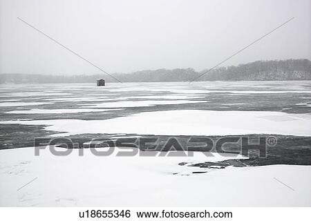 Scenic of frozen lake with ice fishing shack in Green Lake, Minnesota View Large Photo Image Stock Photograph - Scenic of frozen lake with ice fishing shack in Green Lake, Minnesota. Fotosearch