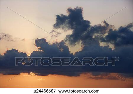 Sky at sunset with clouds View Large Photo Image Stock Photo - Sky at sunset with clouds . Fotosearch