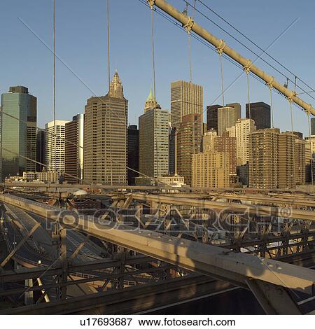 Stock Photo - Manhattan skyline from Brooklyn Bridge, New York City. Fotosearch