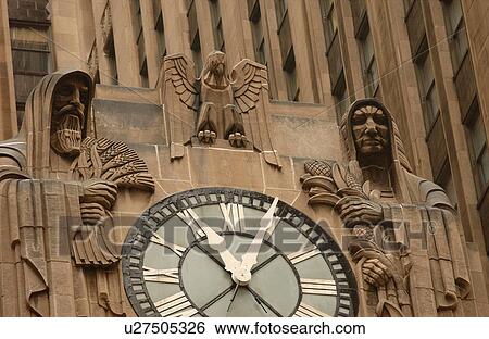Clock on the front of a building View Large Photo Image Stock Photograph - Clock on the front of a building. Fotosearch