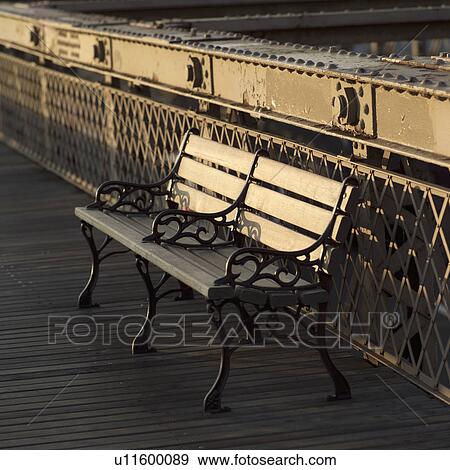 Stock Photo - Bench on the Brooklyn Bridge, New York City. Fotosearch