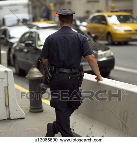 Stock Image - Police Officer, New York City. Fotosearch