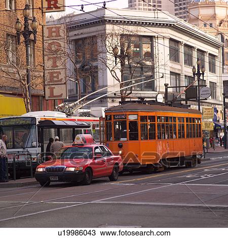 Trolley Car and Bus In Street of San Francisco View Large Photo Image Stock Image - Trolley Car and Bus In Street of San Francisco. Fotosearch