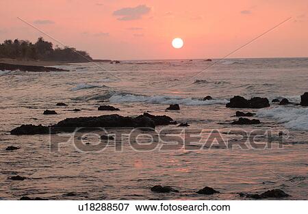 Stock Photo - Big Island of Hawaii - sunset from beach. Fotosearch