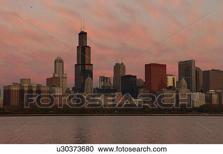 Stock Image - City view of Chicago at twilight. Fotosearch