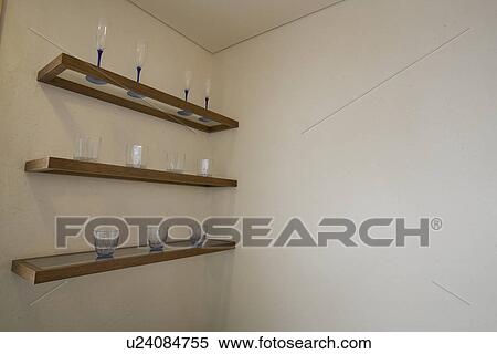 Shelves on wall View Large Photo Image Stock Photography - Shelves on wall. Fotosearch