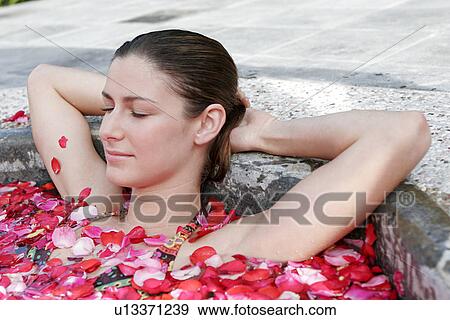 A young woman having aromatherapy bath. View Large Photo Image Stock Photo - A young woman having aromatherapy bath.. Fotosearch