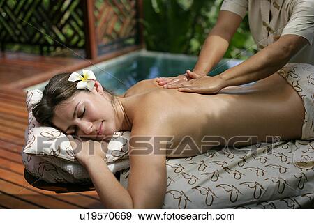 A young woman having massage. View Large Photo Image Stock Photo - A young woman having massage.. Fotosearch