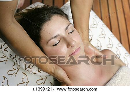 A young woman lying with eyes closed. View Large Photo Image Stock Photo - A young woman lying with eyes closed.. Fotosearch