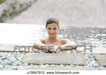 View of a young woman smiling. View Large Photo Image Stock Image - View of a young woman smiling.. Fotosearch