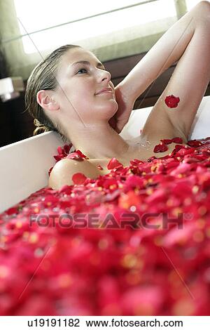 A young woman having aromatherapy bath. View Large Photo Image Stock Image - A young woman having aromatherapy bath.. Fotosearch