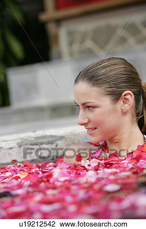 A young woman having aromatherapy bath. View Large Photo Image Stock Image - A young woman having aromatherapy bath.. Fotosearch