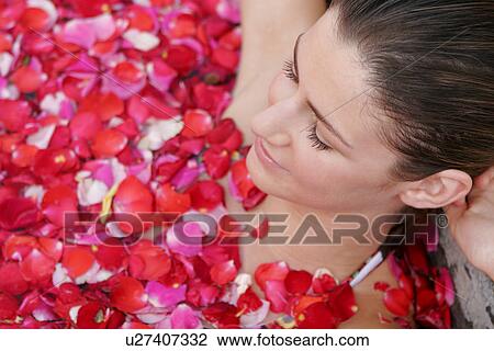 A young woman having aromatherapy bath. View Large Photo Image Stock Image - A young woman having aromatherapy bath.. Fotosearch