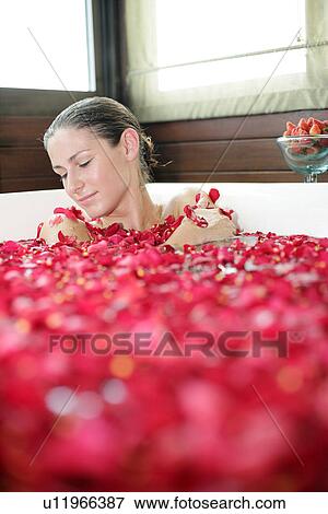 A young woman having aromatherapy bath. View Large Photo Image Stock Photo - A young woman having aromatherapy bath.. Fotosearch