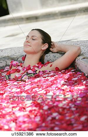 A young woman having aromatherapy bath. View Large Photo Image Stock Photograph - A young woman having aromatherapy bath.. Fotosearch
