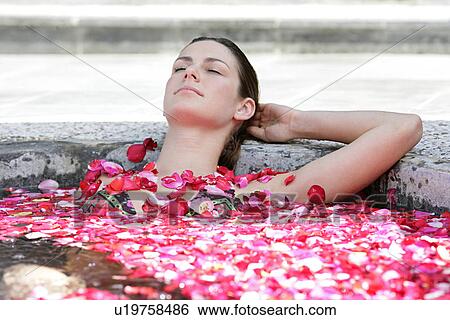 A young woman having aromatherapy bath. View Large Photo Image Stock Photograph - A young woman having aromatherapy bath.. Fotosearch