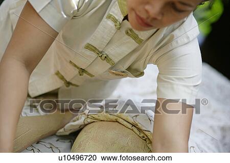 Close-up of a masseuse. View Large Photo Image Stock Image - Close-up of a masseuse.. Fotosearch