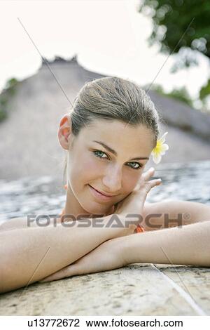 Portrait of a young woman smiling. View Large Photo Image Stock Image - Portrait of a young woman smiling.. Fotosearch