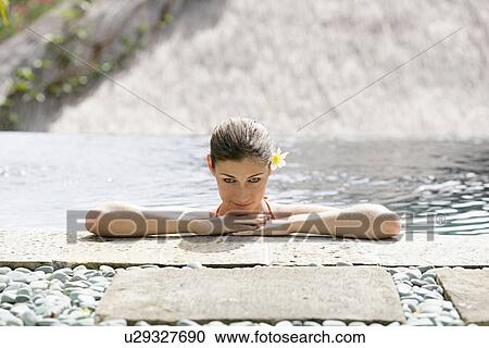 Portrait of a young woman smiling. View Large Photo Image Stock Image - Portrait of a young woman smiling.. Fotosearch