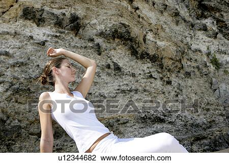 View of a woman relaxing. View Large Photo Image Stock Image - View of a woman relaxing.. Fotosearch