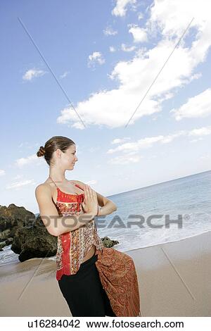 View of a woman with joined hands. View Large Photo Image Stock Image - View of a woman with joined hands.. Fotosearch