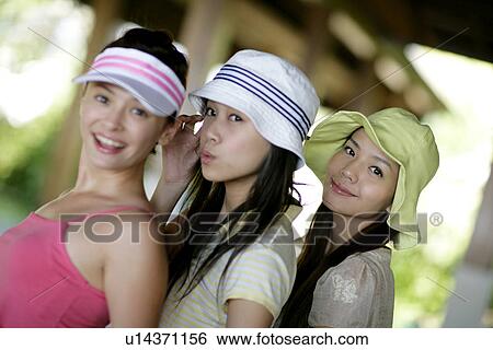 Portrait of young women looking and smiling. View Large Photo Image Stock Photograph - Portrait of young women looking and smiling.. Fotosearch