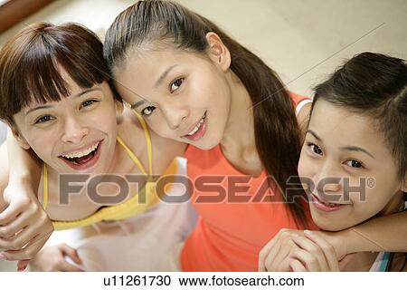 Portrait of young women smiling. View Large Photo Image Stock Image - Portrait of young women smiling.. Fotosearch