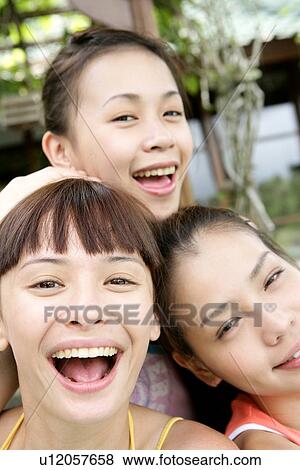Portrait of young women smiling. View Large Photo Image Stock Photo - Portrait of young women smiling.. Fotosearch