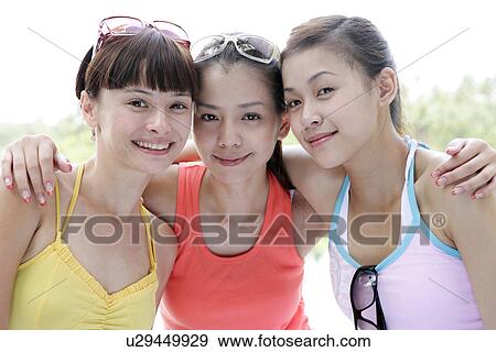 Portrait of young women smiling. View Large Photo Image Stock Photo - Portrait of young women smiling.. Fotosearch