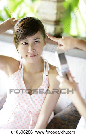 View of a young woman. View Large Photo Image Stock Photograph - View of a young woman.. Fotosearch