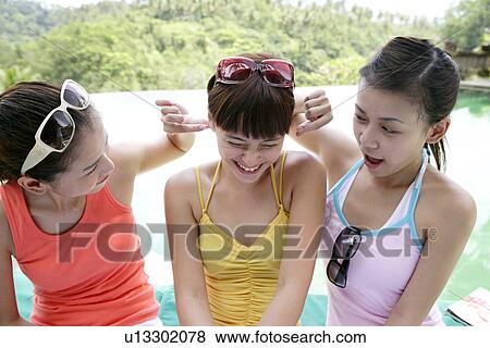 View of playful young women. View Large Photo Image Stock Photo - View of playful young women.. Fotosearch