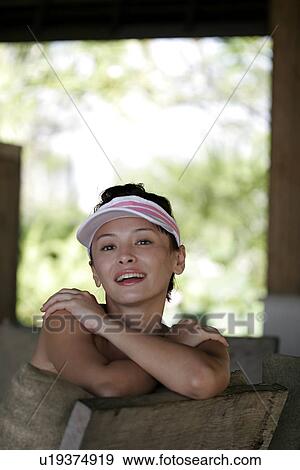 Portrait of a young woman smiling. View Large Photo Image Stock Photo - Portrait of a young woman smiling.. Fotosearch