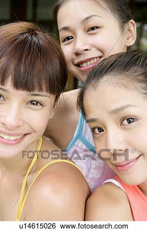 Portrait of young women smiling. View Large Photo Image Stock Photograph - Portrait of young women smiling.. Fotosearch