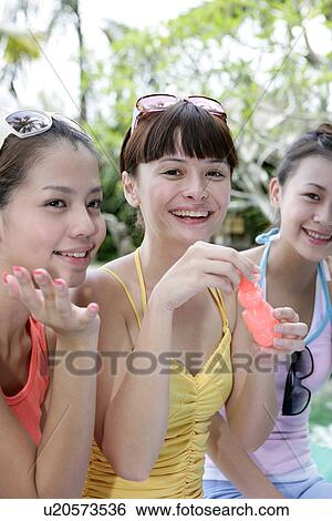Portrait of young women smiling. View Large Photo Image Stock Photograph - Portrait of young women smiling.. Fotosearch