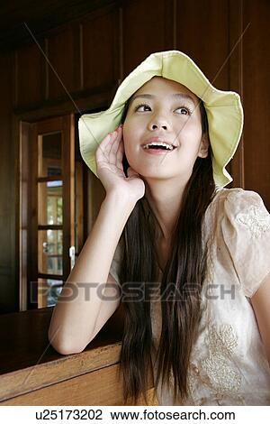 View of a young woman smiling. View Large Photo Image Stock Image - View of a young woman smiling.. Fotosearch