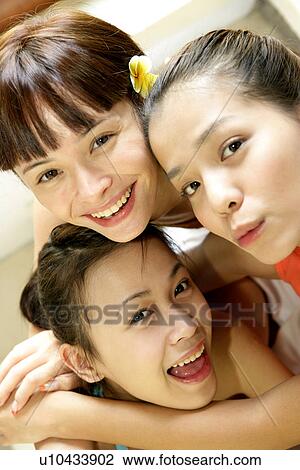 View of young women smiling. View Large Photo Image Stock Image - View of young women smiling.. Fotosearch